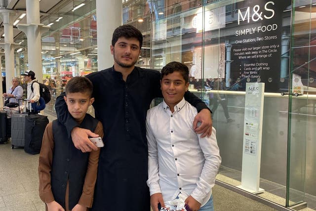 Obaidullah (far right) was reunited with his twin Irfanullah (far left) on Wednesday (PA)
