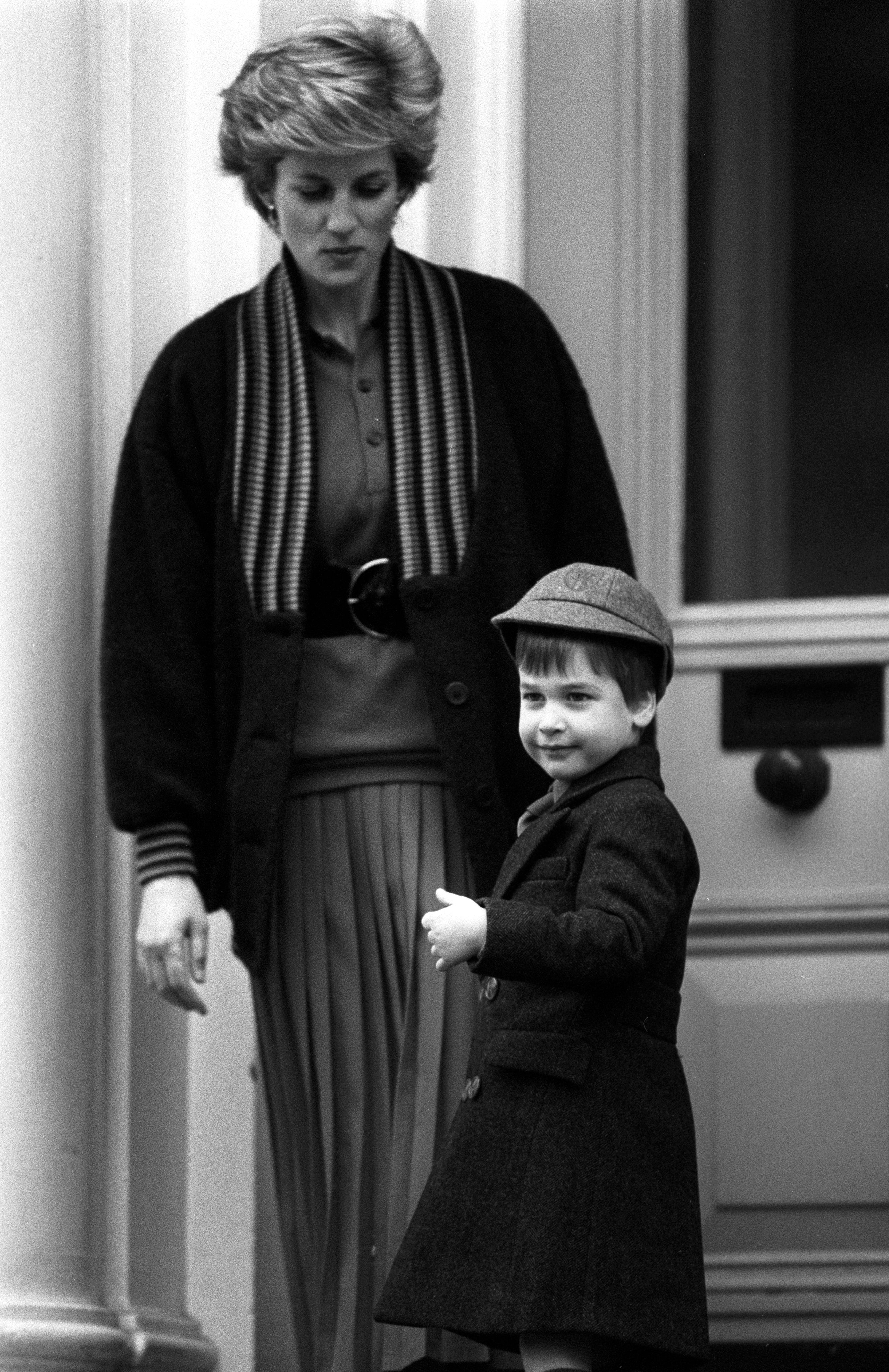 Four-year-old Prince William with his mother, the Princess of Wales, waves at onlookers before his first day at Wetherby School in Notting Hill Gate (PA)
