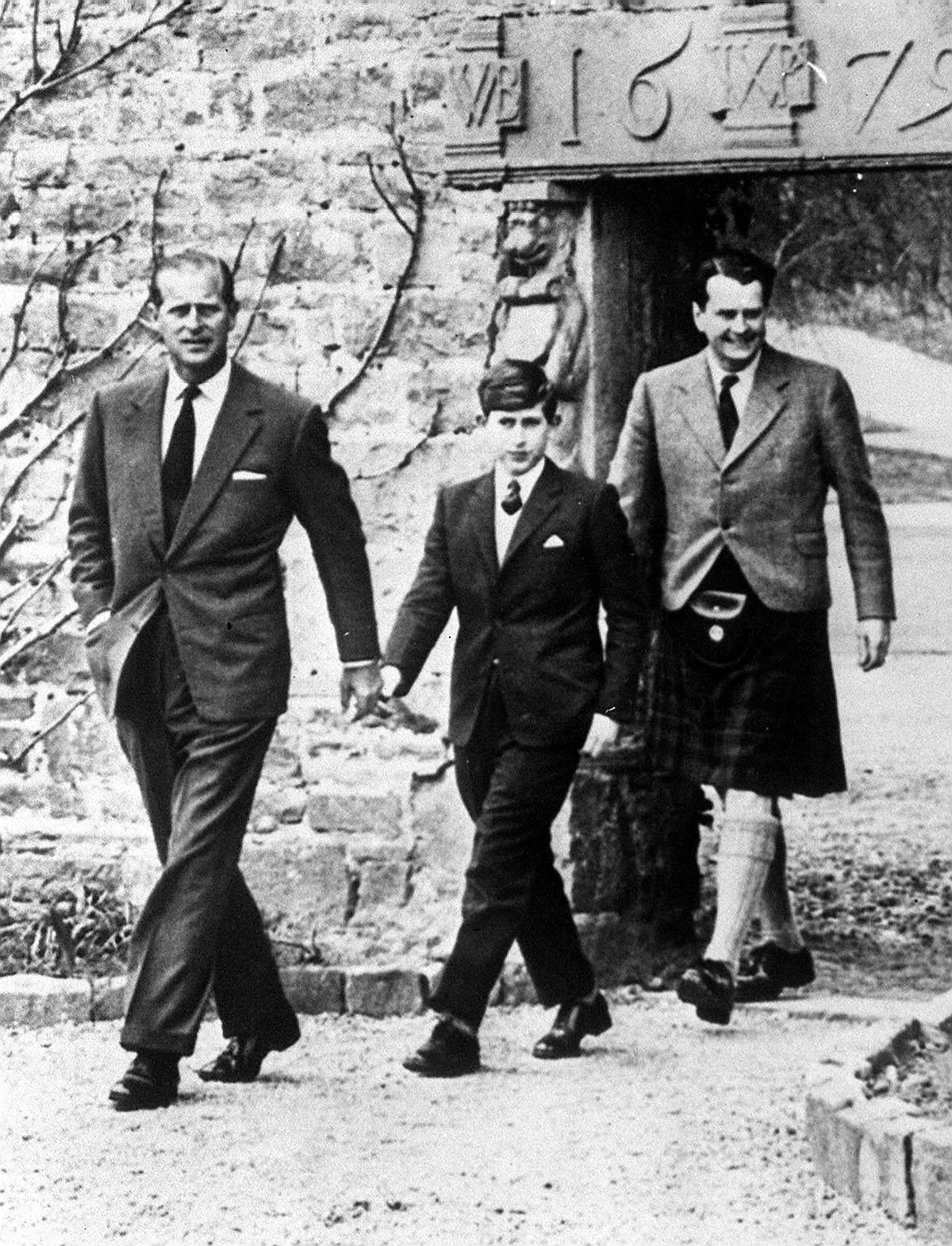 Charles with his father Philip on his first day at Gordonstoun in 1962 (PA)