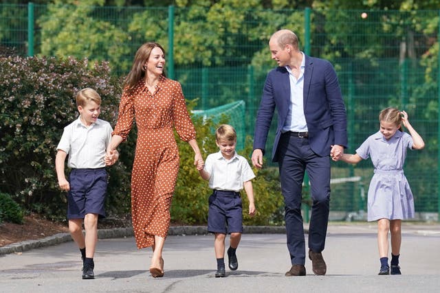 <p>Prince William was forced to settle for a simple stroke of his son’s hair at the school gates</p>
