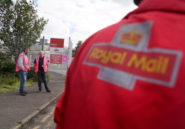 Royal Mail staff from the Communication Workers Union are on strike in a dispute over pay and conditions (Andrew Milligan/PA)