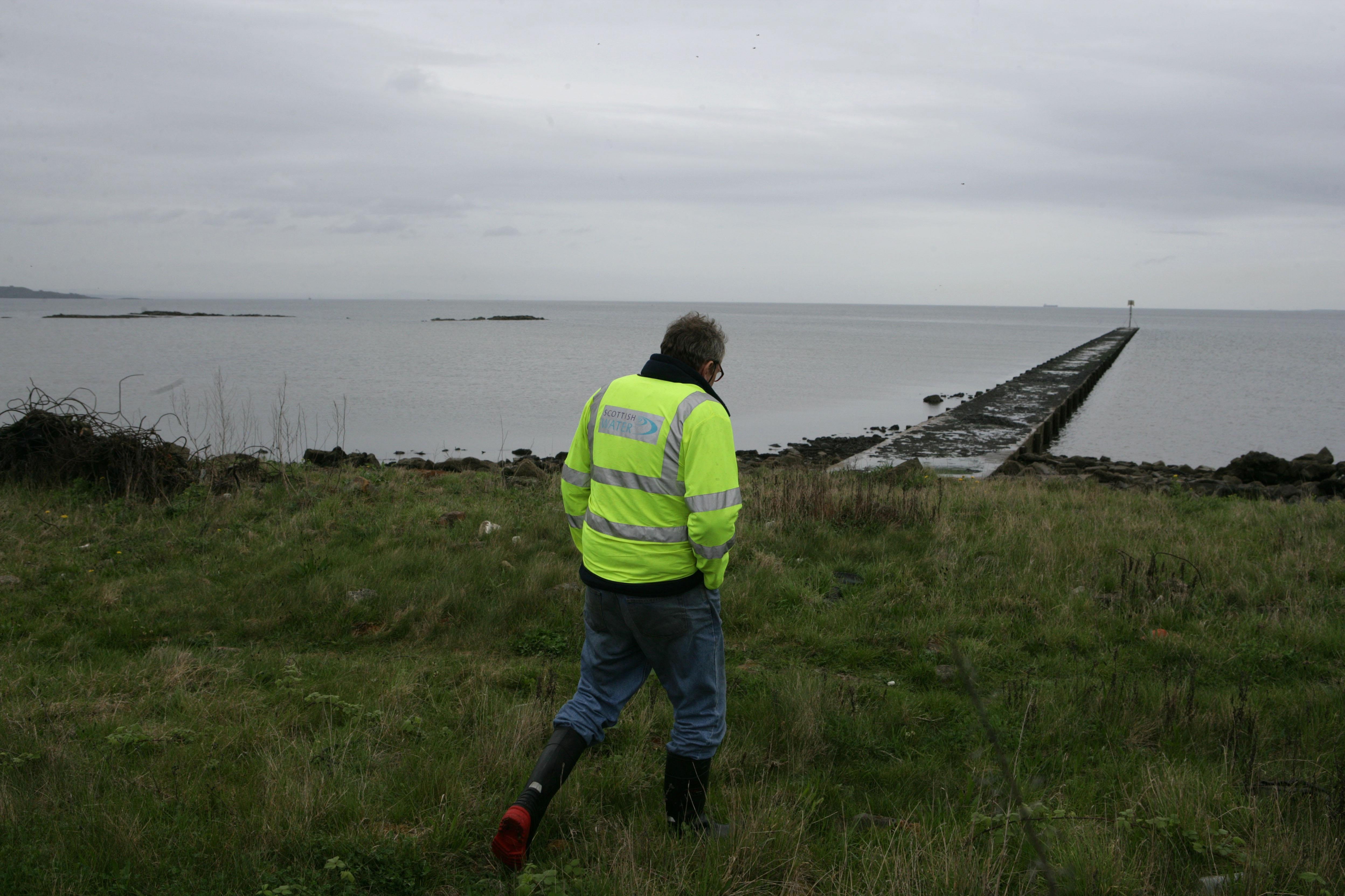 A sewage outflow pipe at Seafield beach, Scotland (PA)