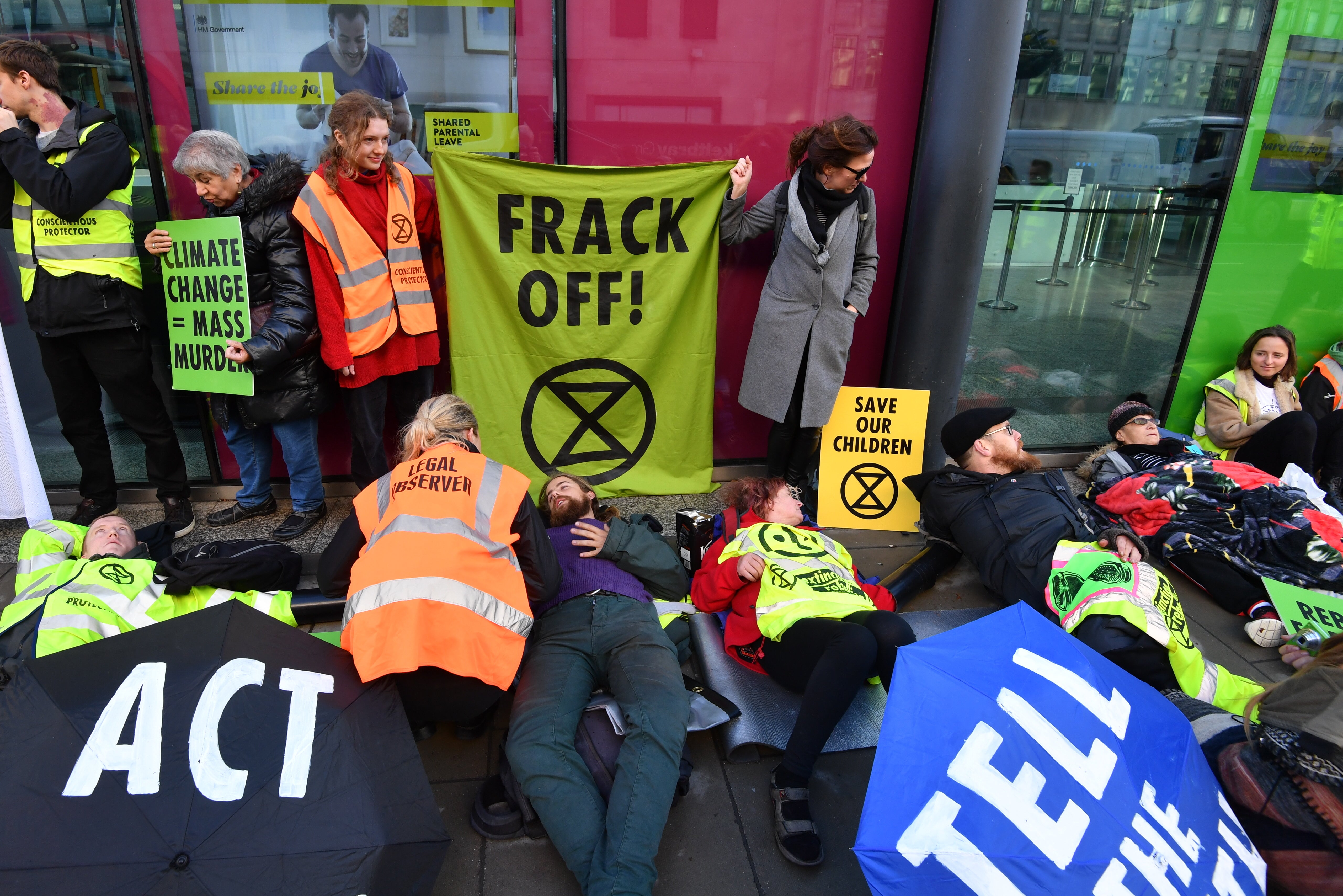 Activists from Extinction Rebellion stage an anti-fracking protest outside the Department for Business, Energy and Industrial Strategy in Westminster, London
