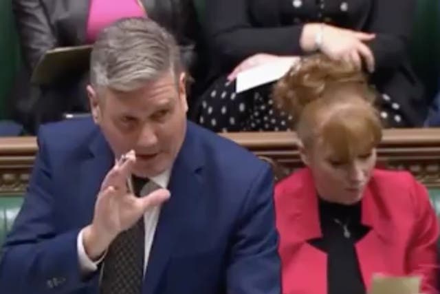 <p>Keir Starmer speaks in the Commons as his deputy Angela Rayner receives a note about the Queen’s health. </p>