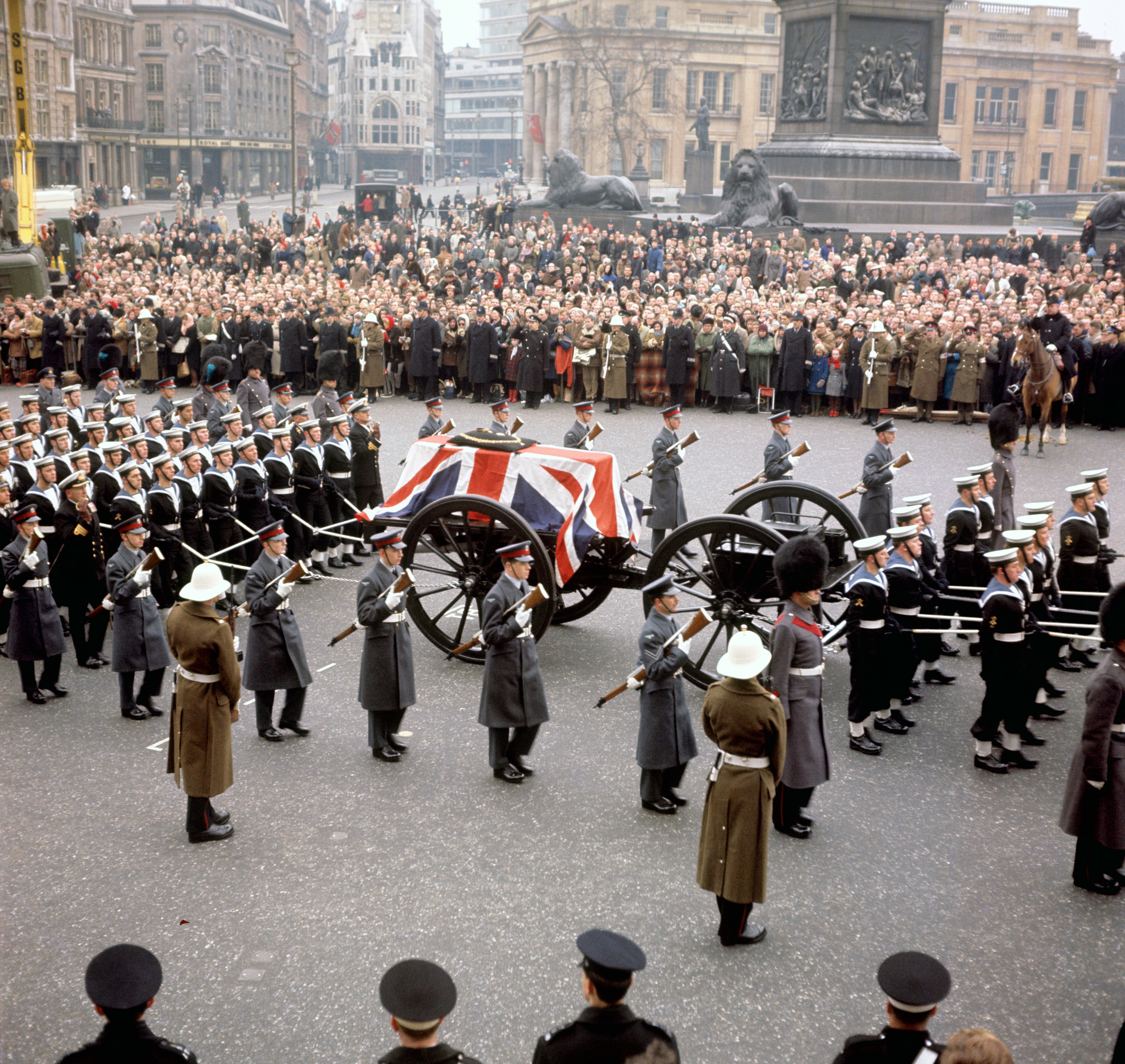 The gun carriage carrying the coffin of Sir Winston Churchill crossing London’s Trafalgar Square (PA)