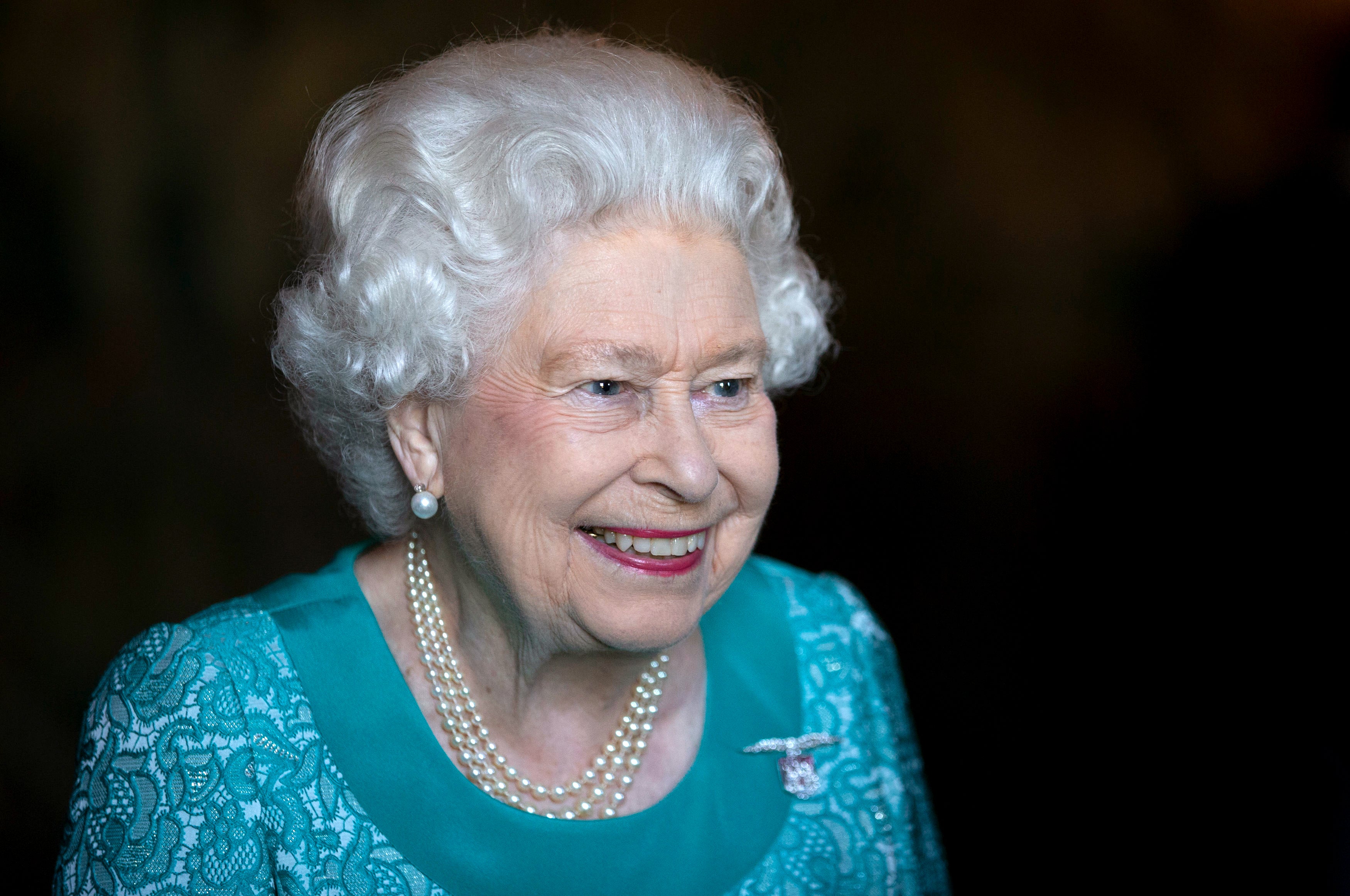 The Queen attends a reception for 603 (City of Edinburgh) Squadron, Royal Auxiliary Air Force, who have been honoured with the Freedom of The City of Edinburgh, at the Palace of Holyroodhouse in Edinburgh (Jane Barlow/PA)