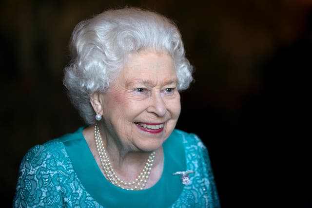 The Queen attends a reception for 603 (City of Edinburgh) Squadron, Royal Auxiliary Air Force, who have been honoured with the Freedom of The City of Edinburgh, at the Palace of Holyroodhouse in Edinburgh (Jane Barlow/PA)