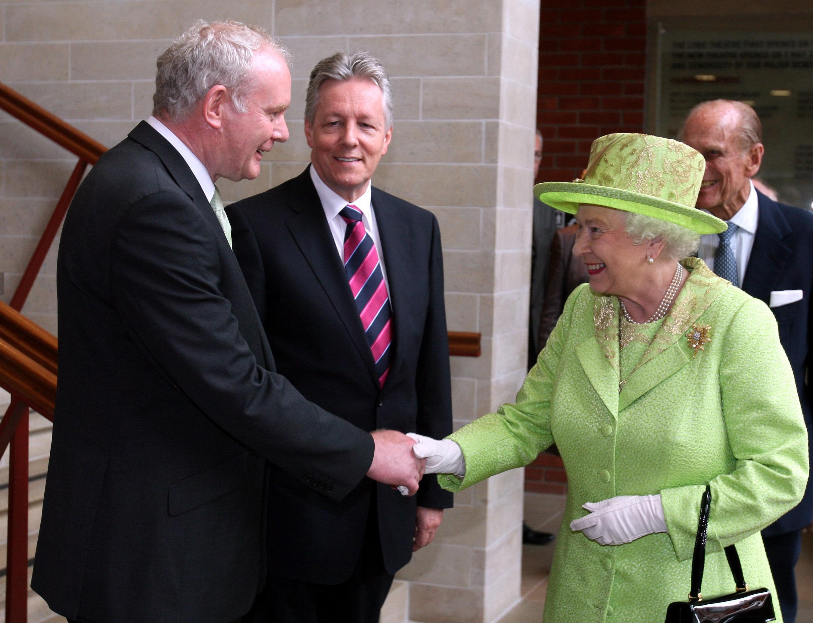 Paul Faith’s historic photograph of the Queen shaking hands with Northern Ireland’s then deputy First Minister Martin McGuinness in 2012 (Paul Faith/PA)