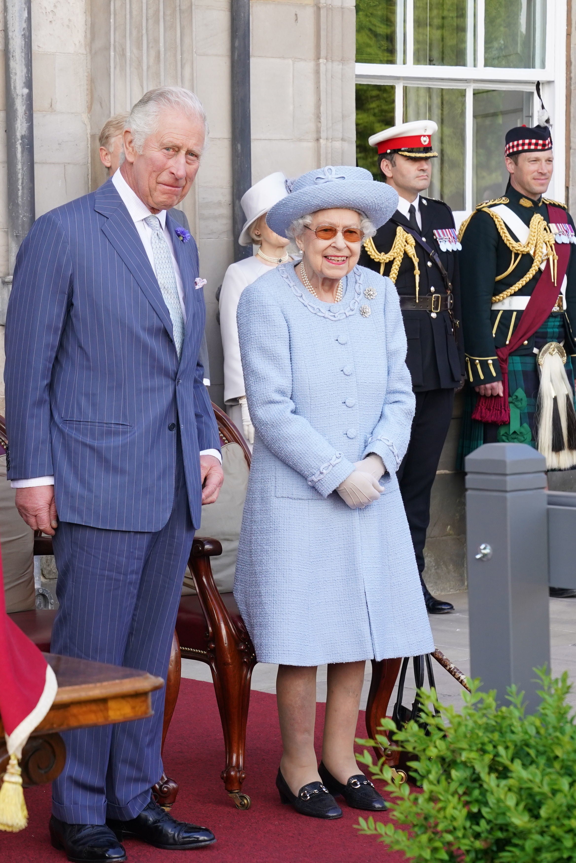 King Charles III, left, with his mother, the Queen (PA)