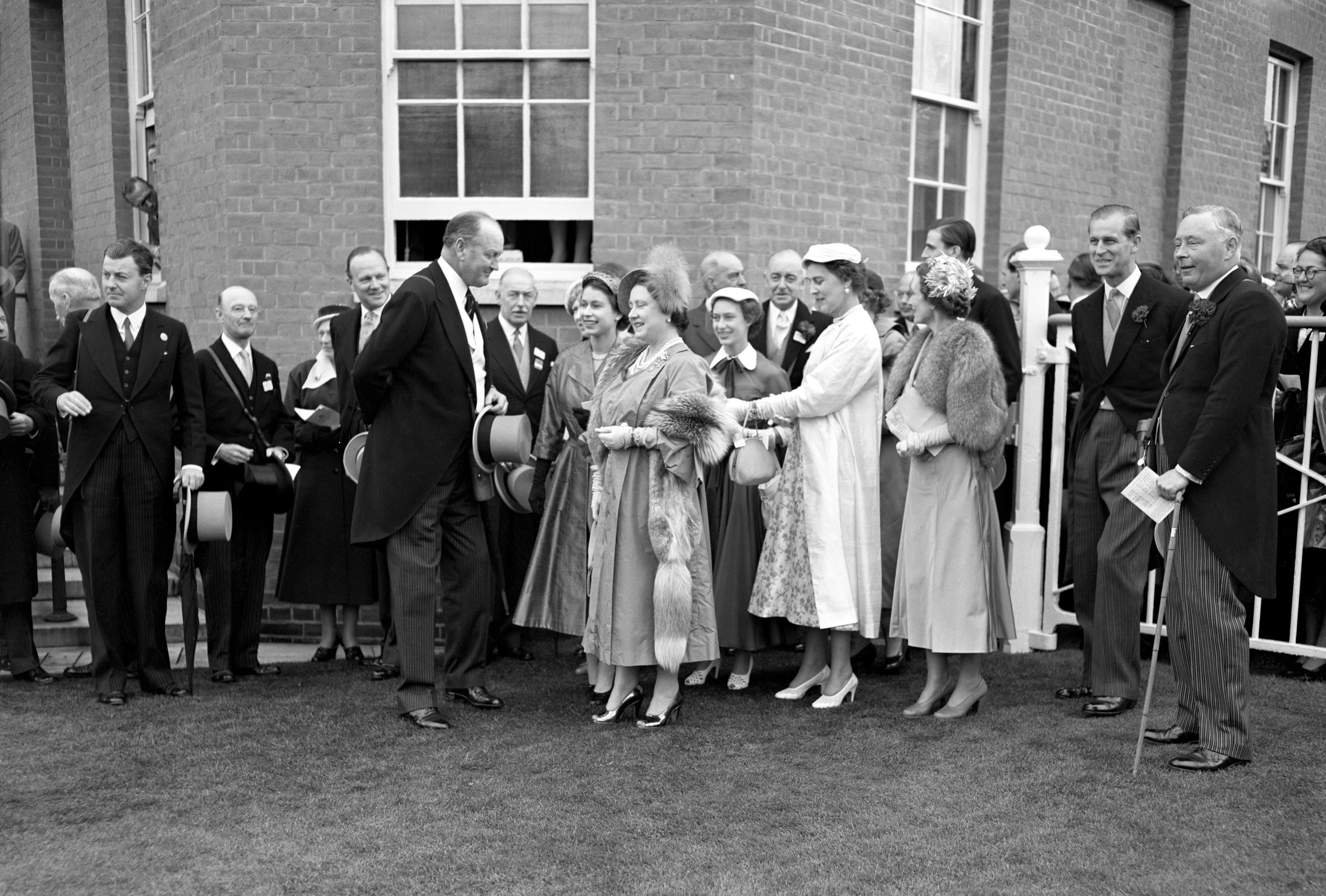 The Queen has had a long-standing interest in horse racing, dating throughout her reign. In 1953 she, alongside the Queen Mother, Princess Margaret, the Duchess of Kent, the Duchess of Gloucester, the Duke of Edinburgh and the Duke of Norfolk congratulated trainer Captain C. Boyd-Rochfort, after the Queen’s horse Choir Boy won the Royal Hunt Cup at Royal Ascot (PA Archive)