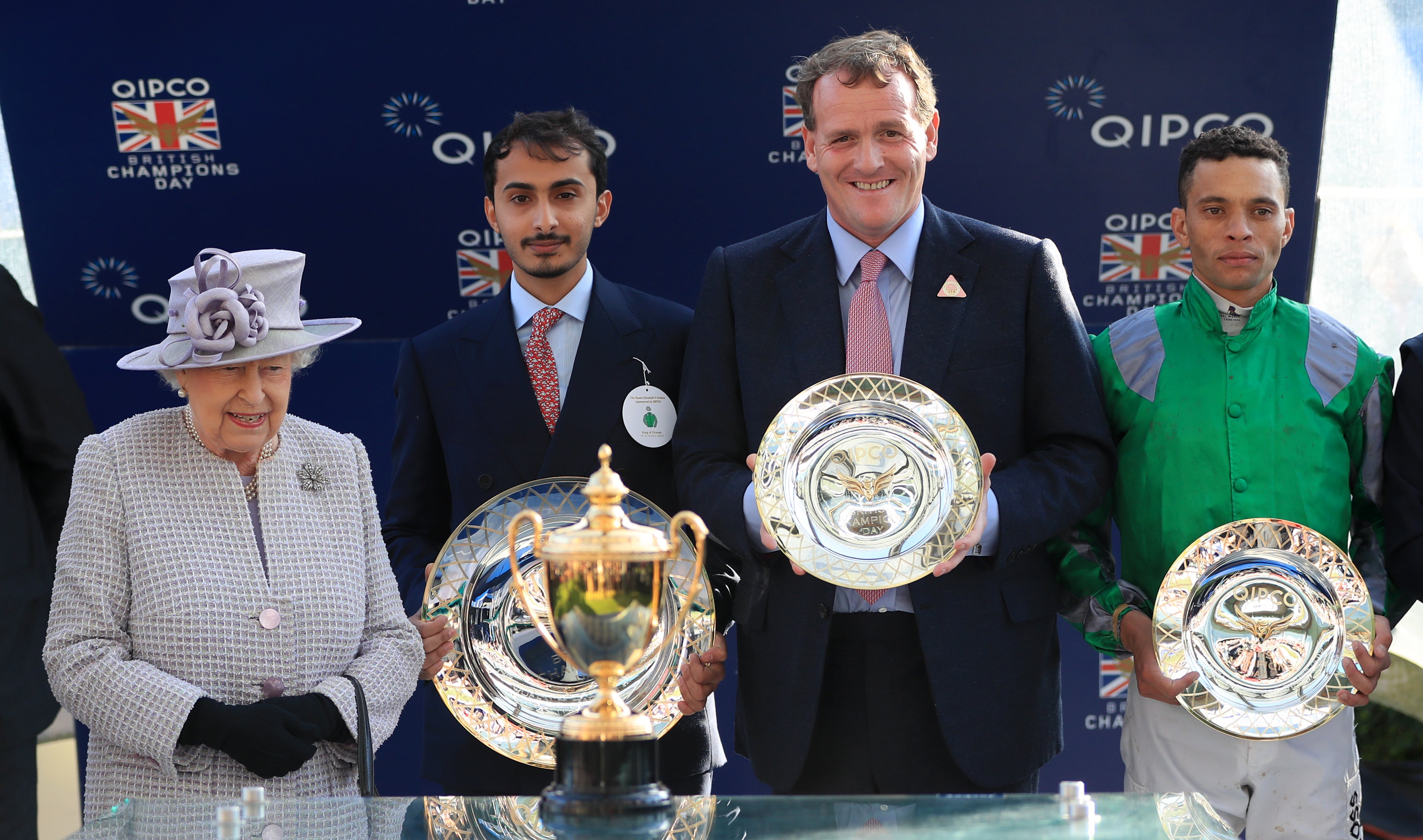 Queen Elizabeth II alongside winning Jockey Sean Levey during Champions Day at the Royal Ascot Racecourse in 2019 (Simon Cooper/PA)