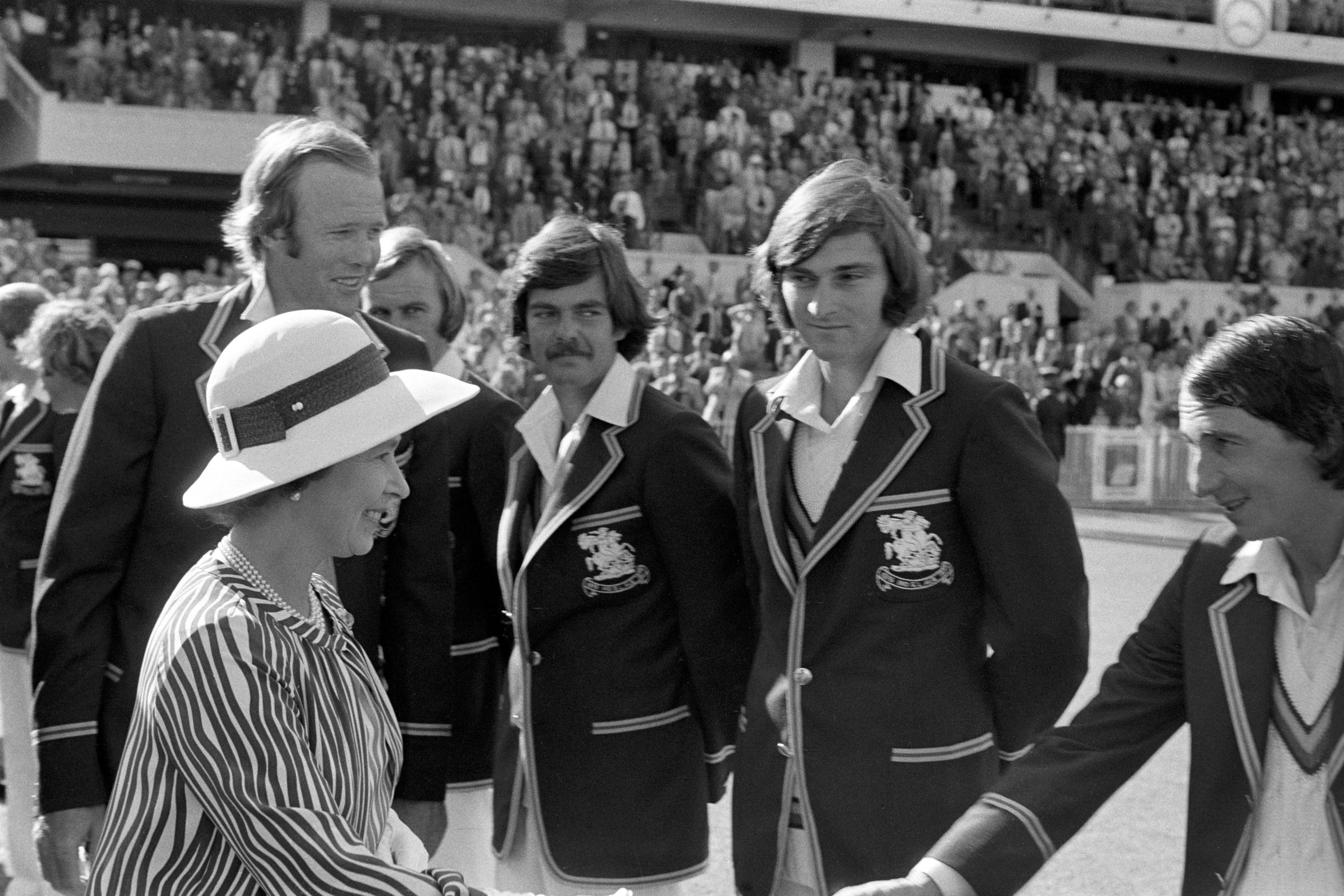 On a tour of Australia, Queen Elizabeth II was introduced to the England cricket team by captain Tony Greig, before the start of the Centenary Test against Australia in Melbourne in 1977 (PA Archive)