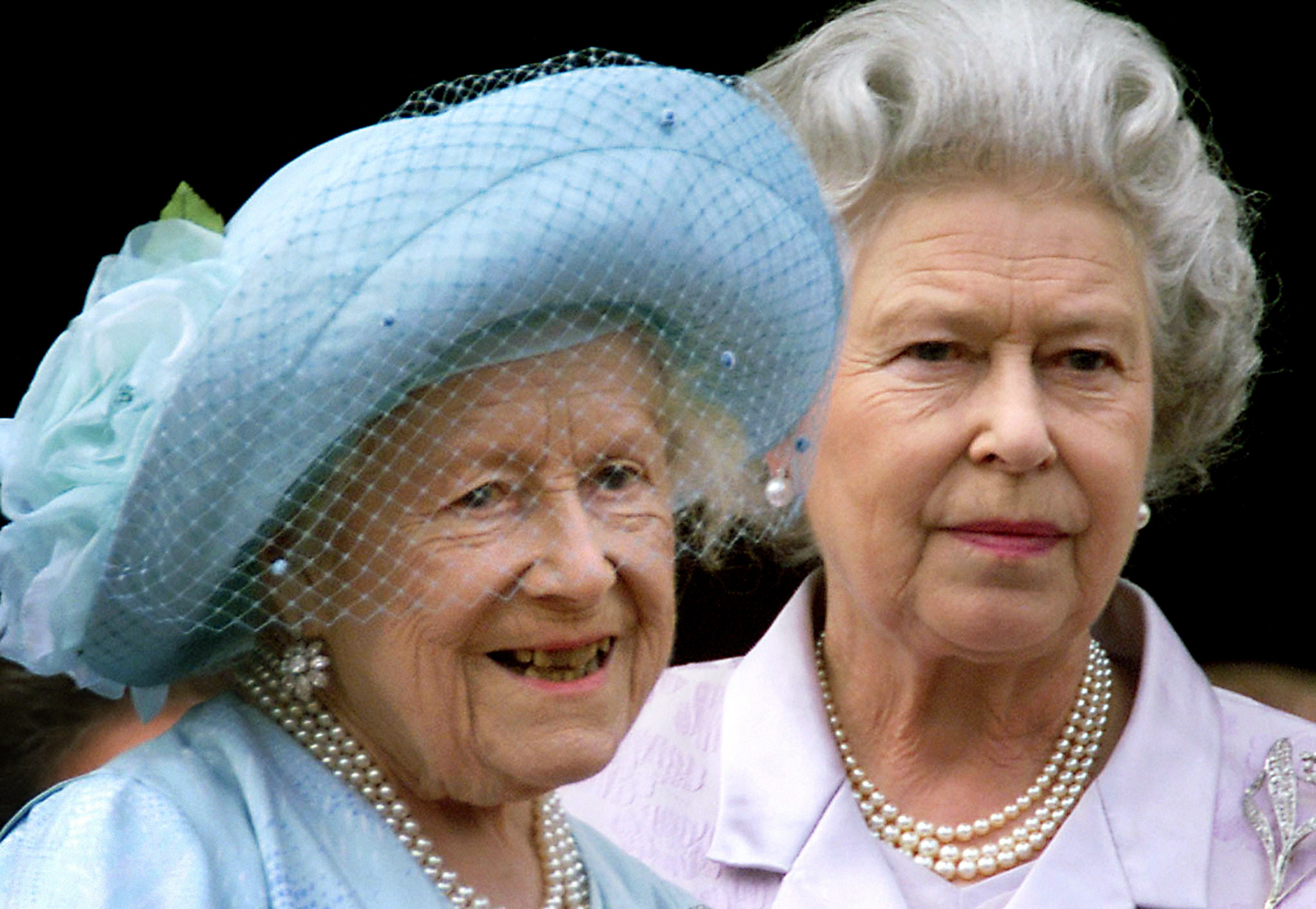 Queen Elizabeth The Queen Mother celebrating her 100th birthday from the balcony of Buckingham Palace with her daughter Queen Elizabeth II (PA)
