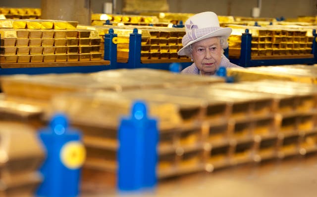 The Queen tours the gold vault during a visit to the Bank of England (Eddie Mulholland/Daily Telegraph/PA)