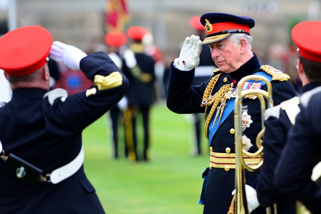 The Prince of Wales salutes during a consecration service at Bramham Park (Richard Martin-Roberts/PA)