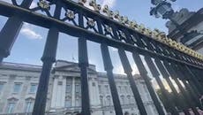 Crowd outside Buckingham Palace stands silent following death of Queen Elizabeth II