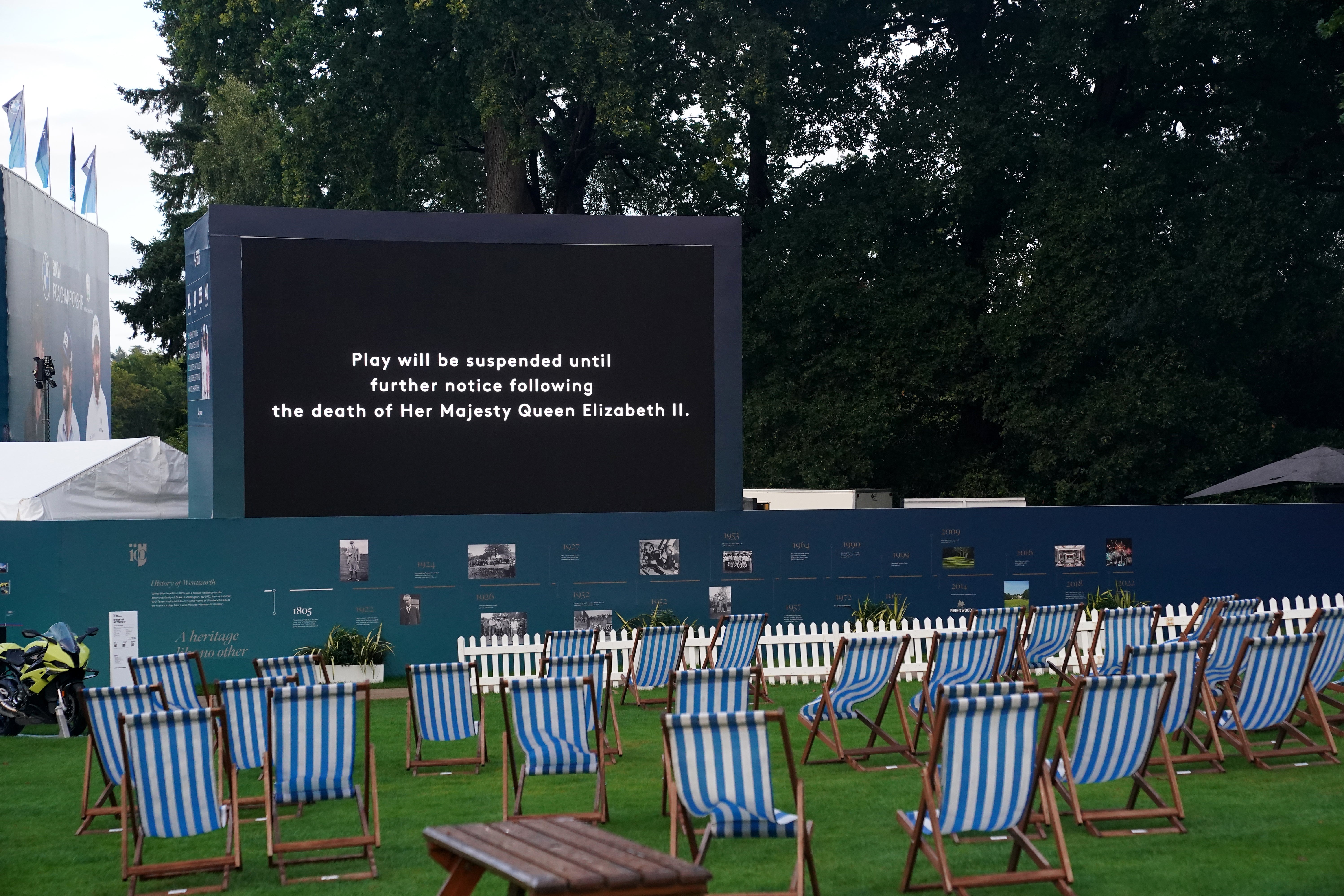 A screen displays a message that play has been suspended following the announcement of the death of Queen Elizabeth II, during day one of the BMW PGA Championship at Wentworth (Adam Davy/PA)