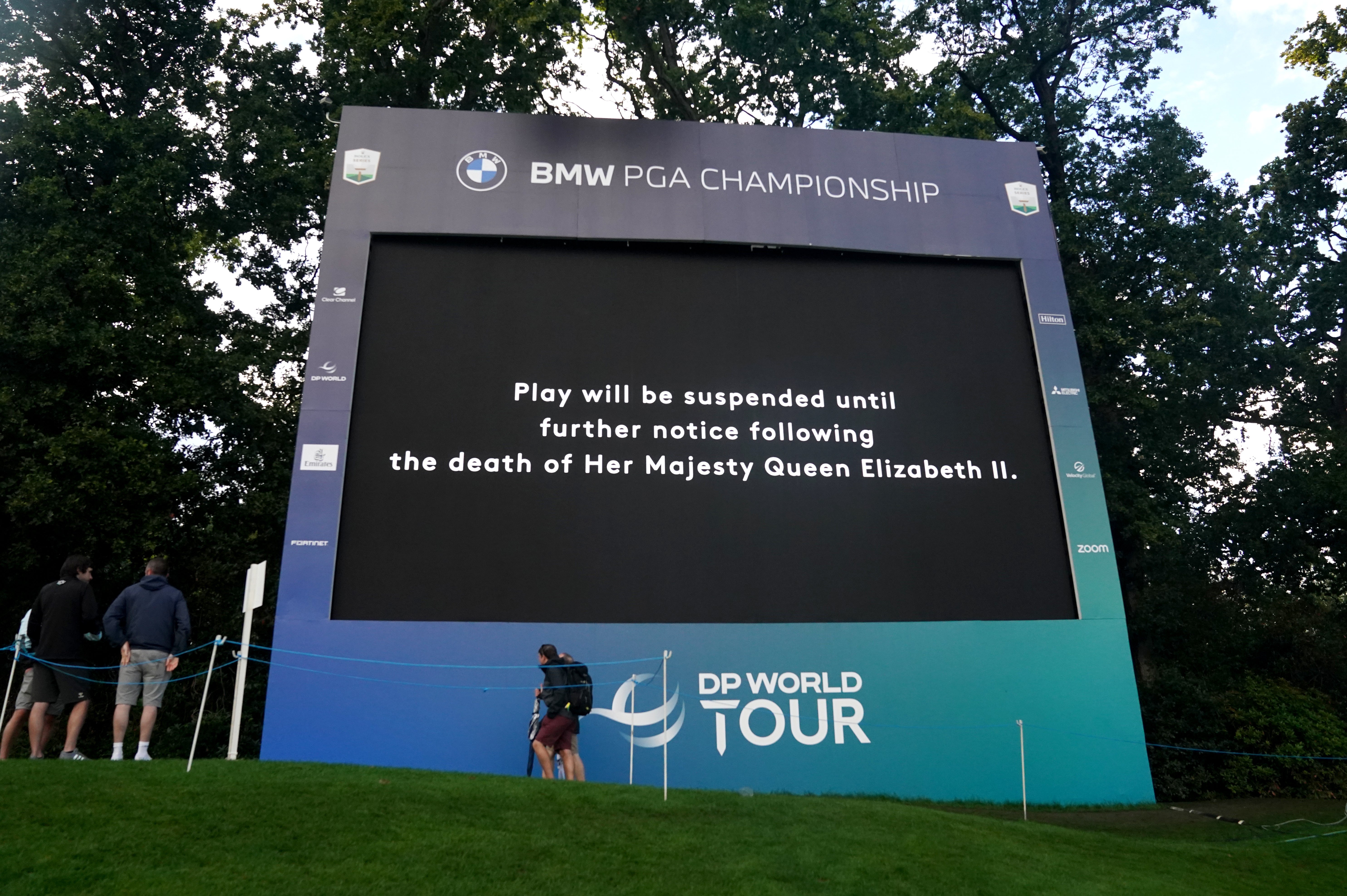 A screen displays a message that play in the BMW PGA Championship has been suspended following the death of Queen Elizabeth II (Adam Davy/PA)