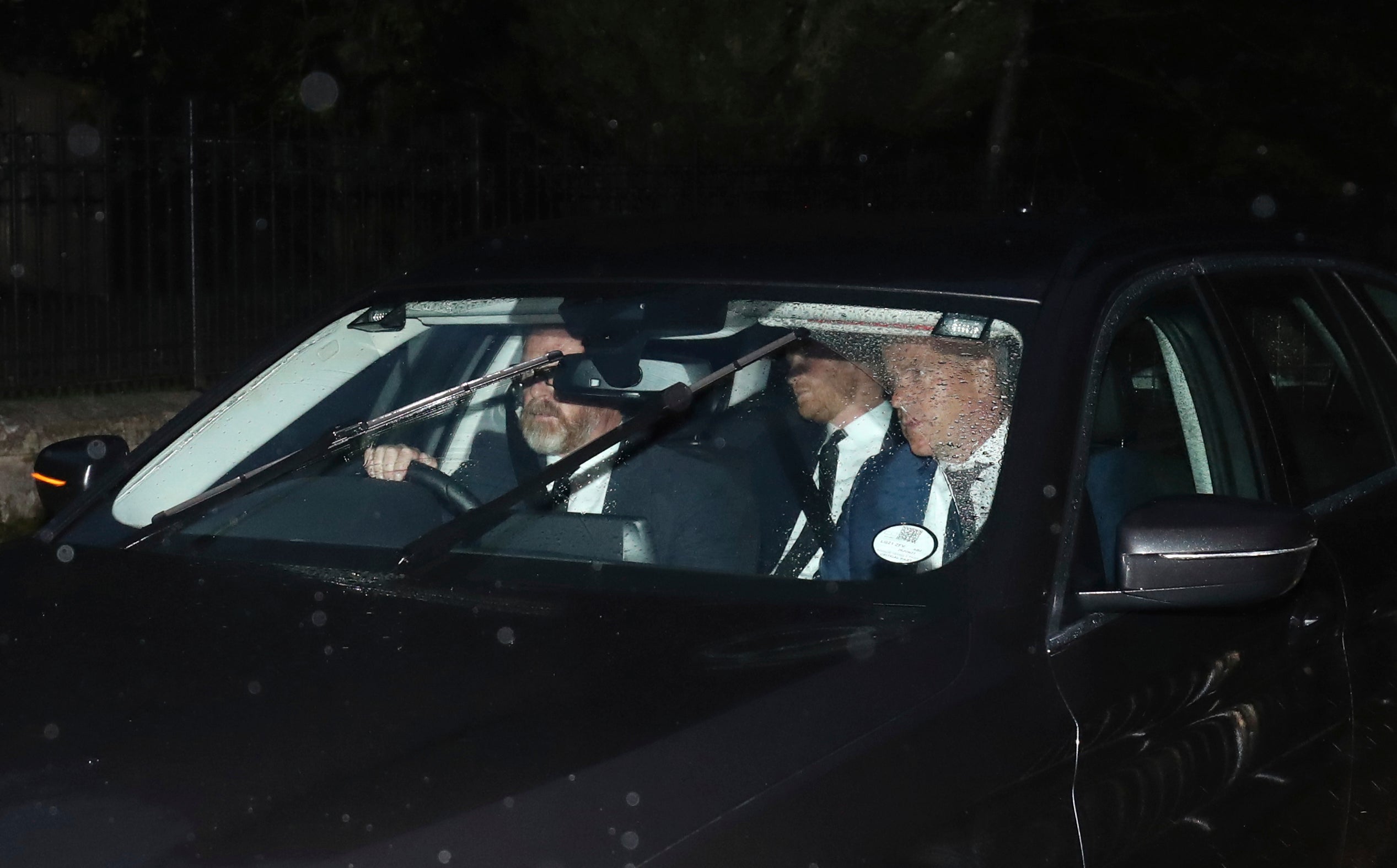 Prince Harry (backseat) arriving at Balmoral