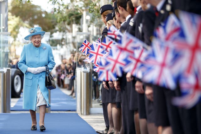 The Queen during a visit to the headquarters of British Airways (Tolga Akmen/PA)