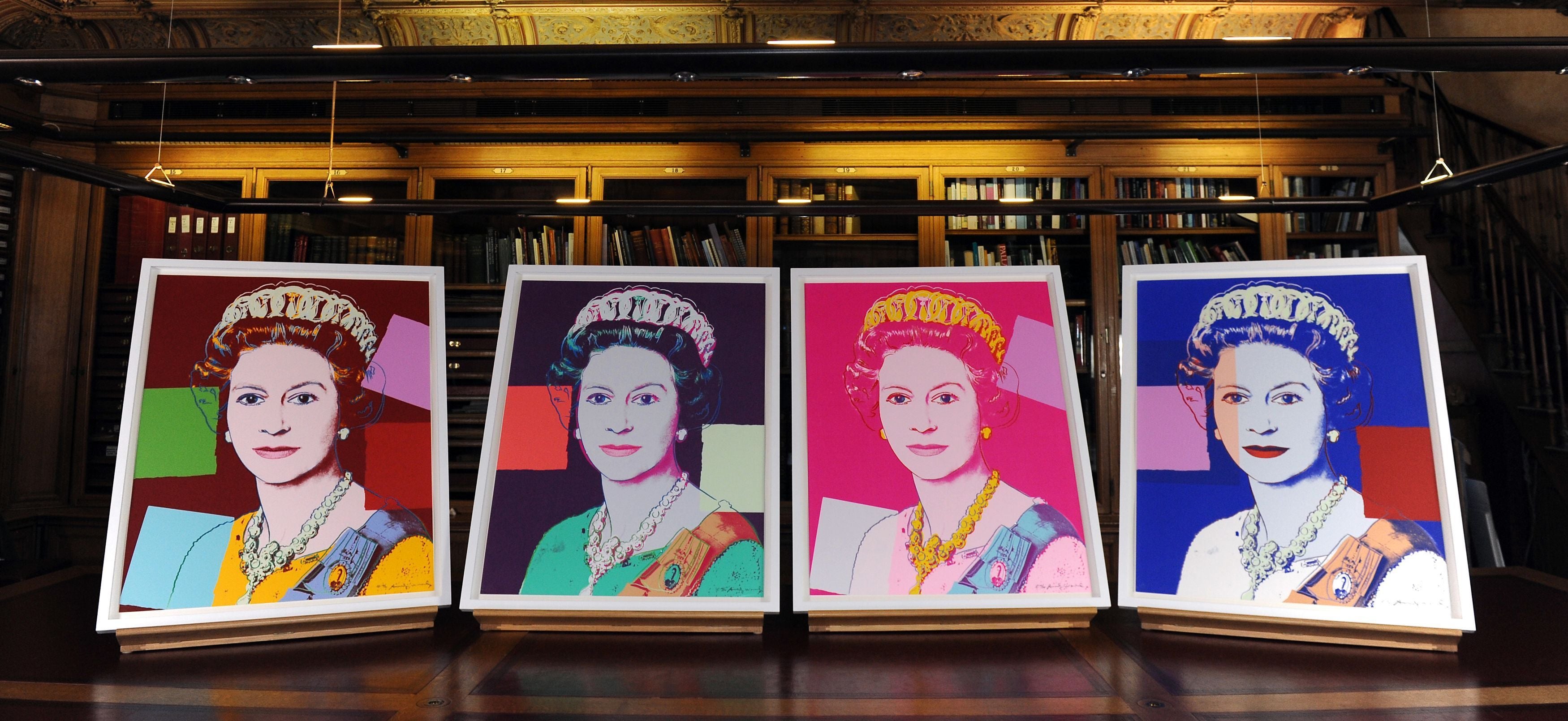 Andy Warhol’s Reigning Queens: Queen Elizabeth II portraits on show in the Lower Library at Windsor Castle (Andrew Matthews/PA)
