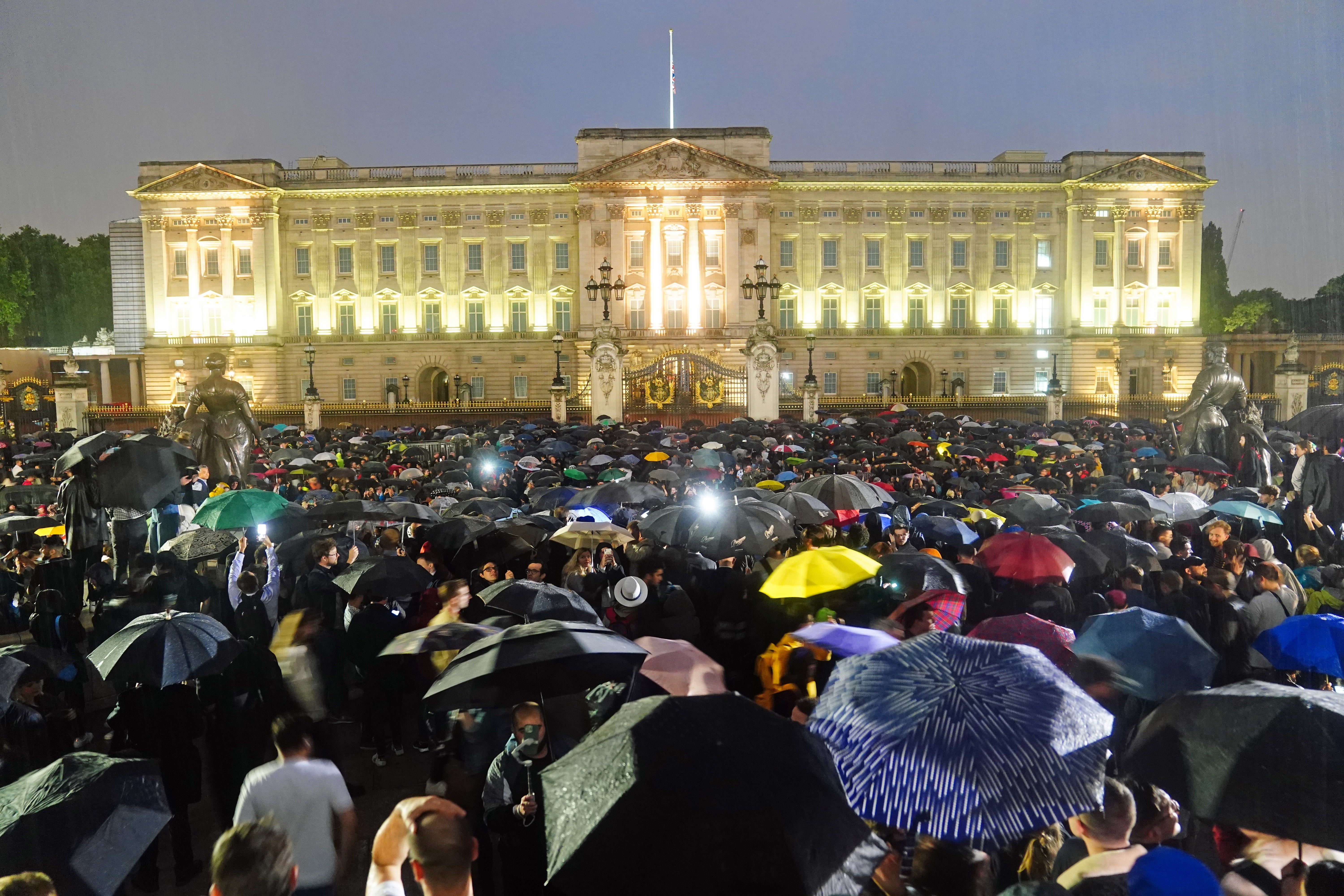 Global media outlets flock to Buckingham Palace to report on news of Queen’s death (Victoria Jones/PA)