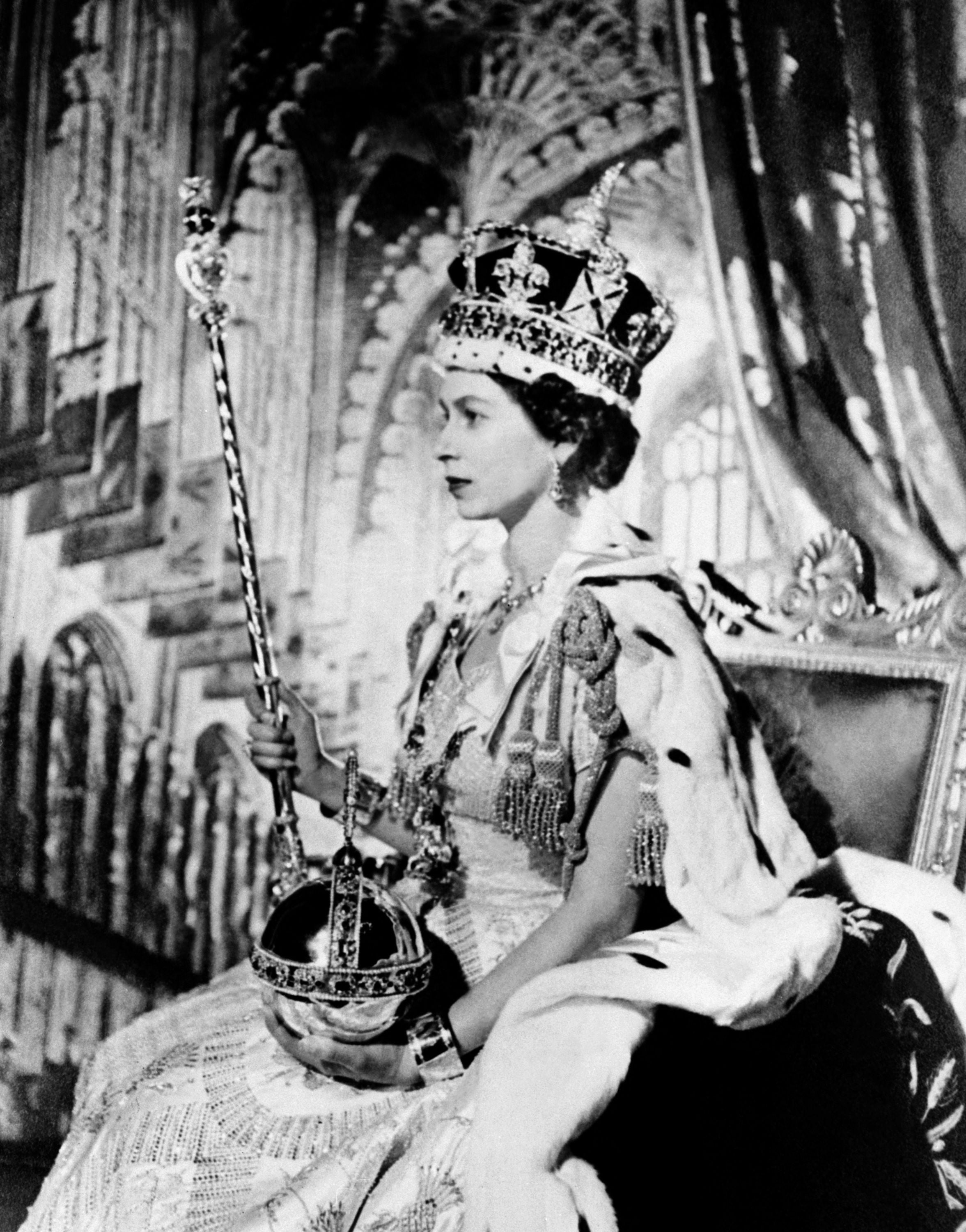 In this file photo taken on 2 June, 1953 the Queen Elizabeth II poses on her Coronation day, in London