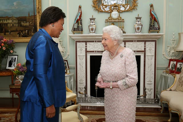Baroness Scotland of Asthal is received by the Queen on her appointment as Commonwealth secretary-general at Buckingham Palace (Chris Radburn/PA)