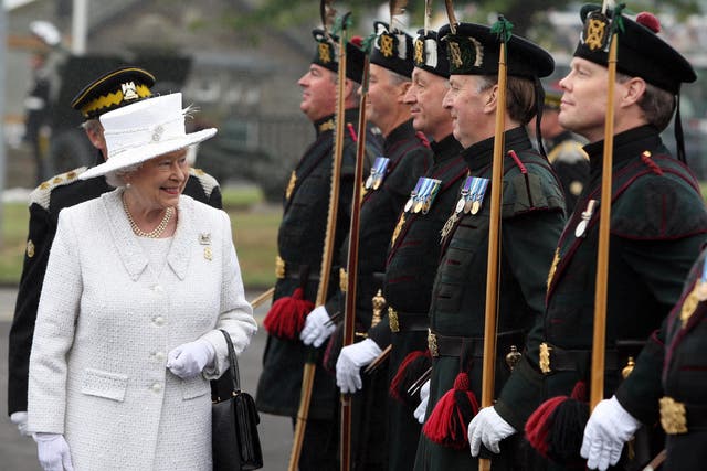 The Queen inspects troops during a visit to The Royal Scots Dragoon Guards at Redford Barracks, Edinburgh (Andrew Milligan/PA)