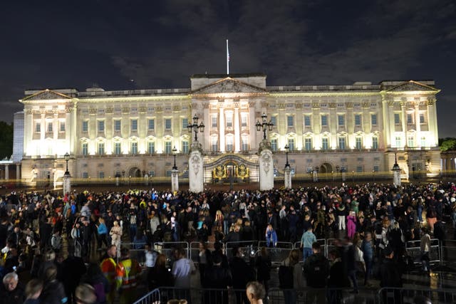 Mourners gather outside Buckingham Palace (PA)