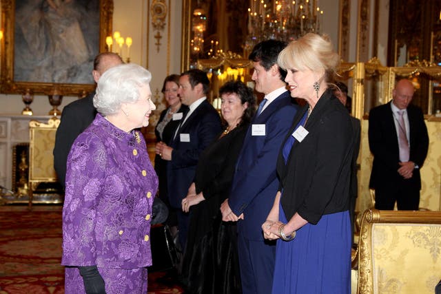 Queen Elizabeth II meets Joanna Lumley during a Reception for Contemporary British Poetry at Buckingham Palace, London (Gareth Fuller/PA)