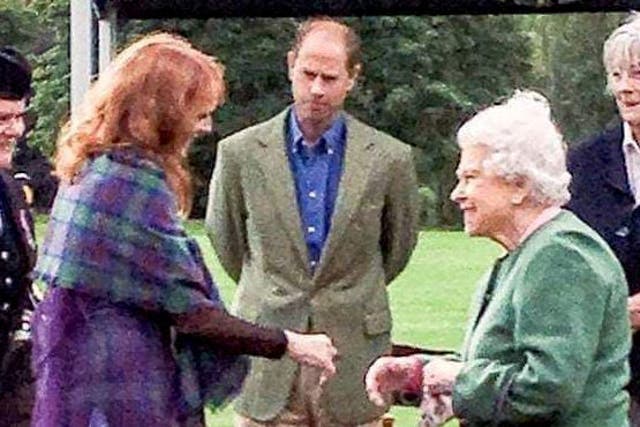 <p>Michaela Foster Marsh meets the late Queen Elizabeth II </p>