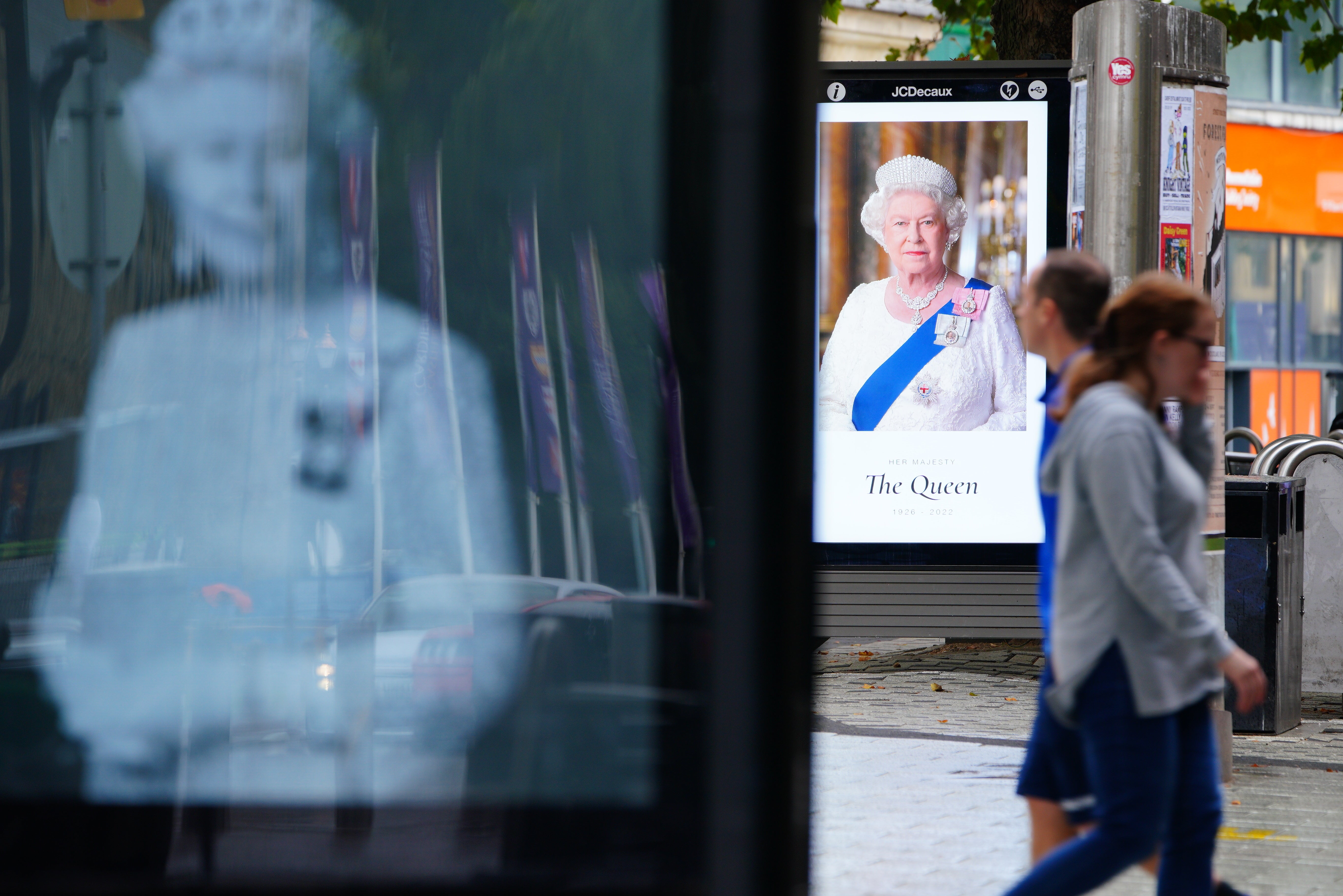 Tributes to the Queen on Queen Street, in Cardiff (Ben Birchall/PA)