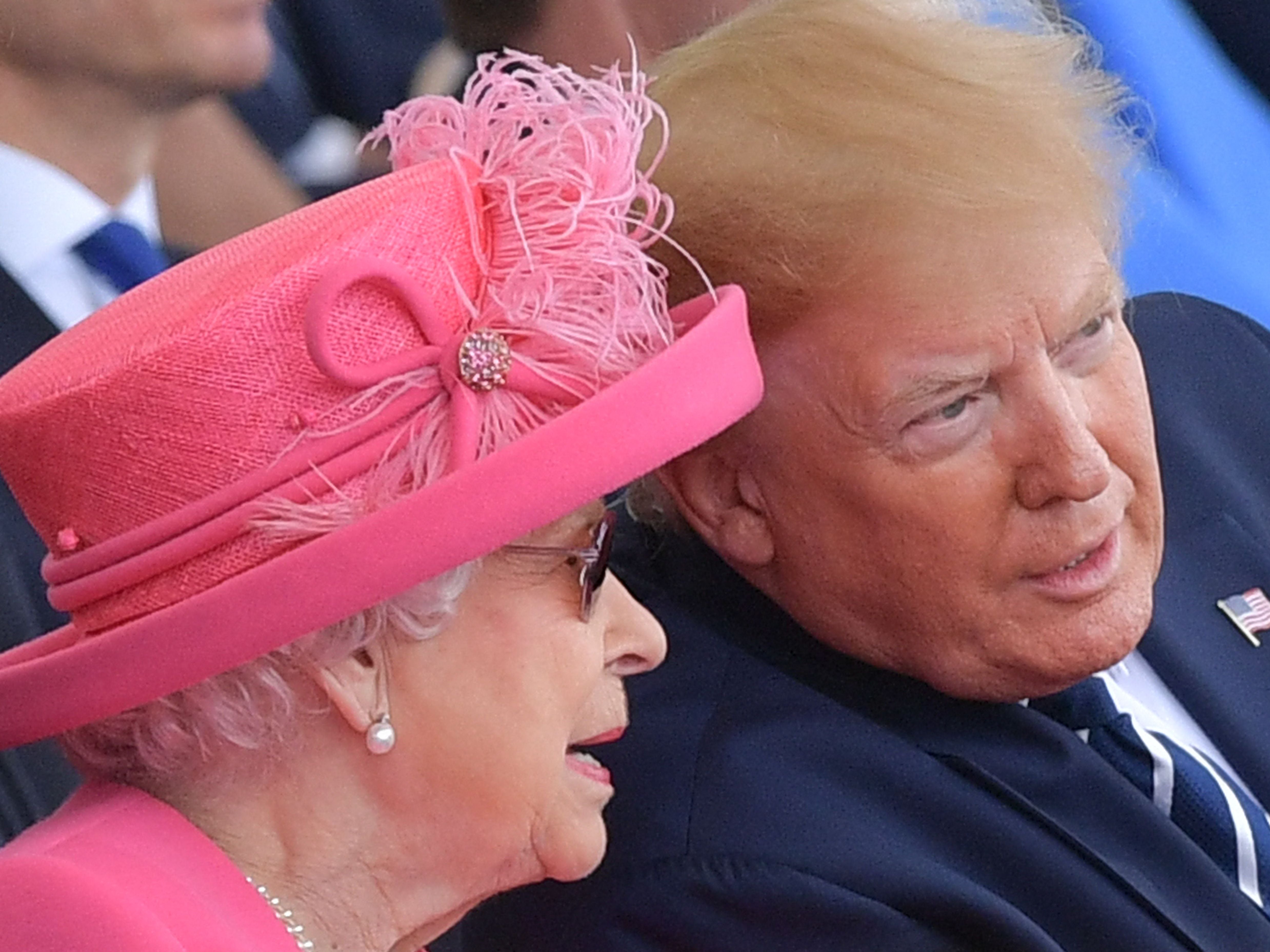 Britain's Queen Elizabeth II (L) talks with US President Donald Trump during an event to commemorate the 75th anniversary of the D-Day landings, in Portsmouth, southern England, on June 5, 2019