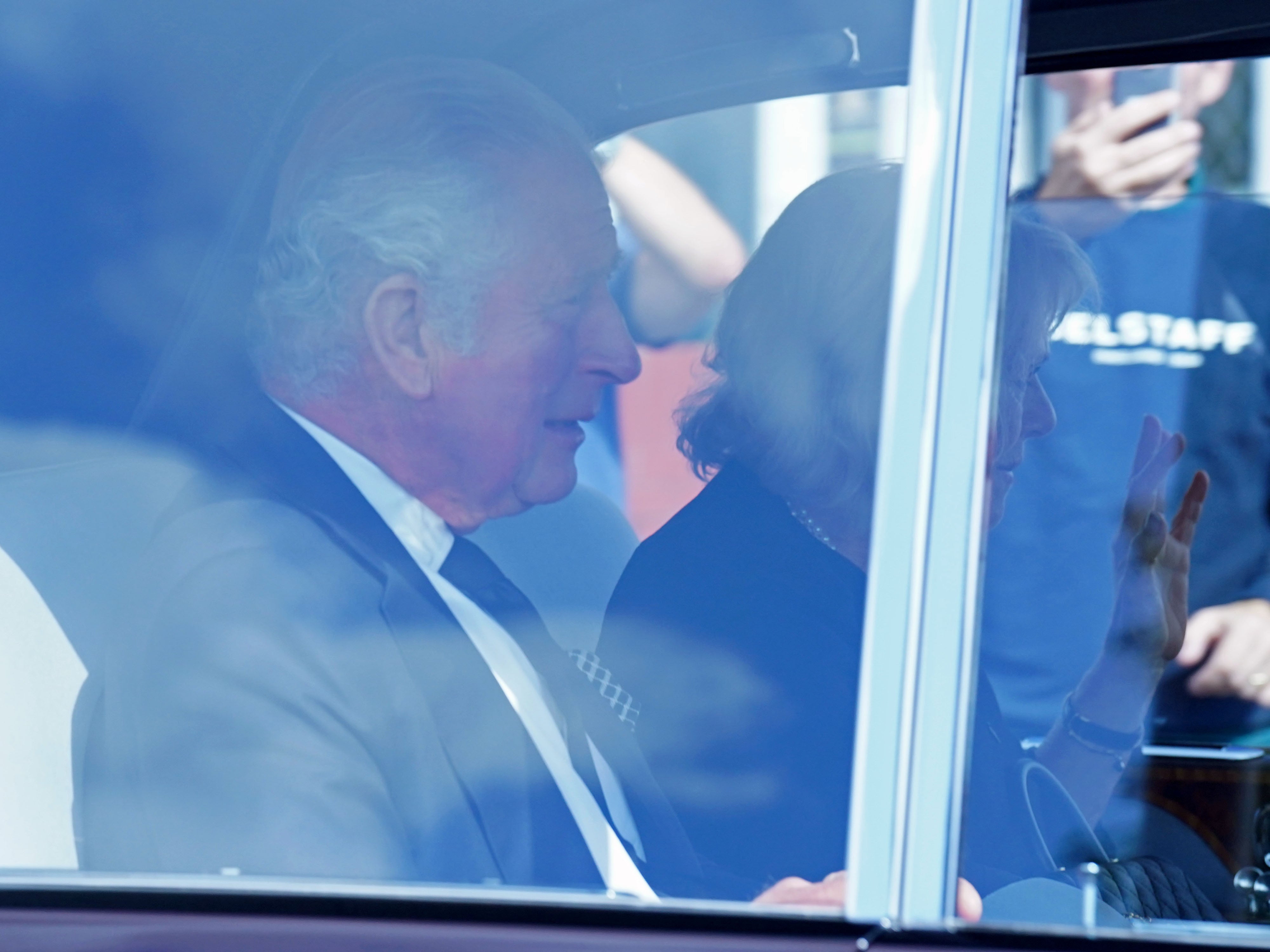 King Charles and the Queen Consort have arrived back in London ahead of his first national address as monarch