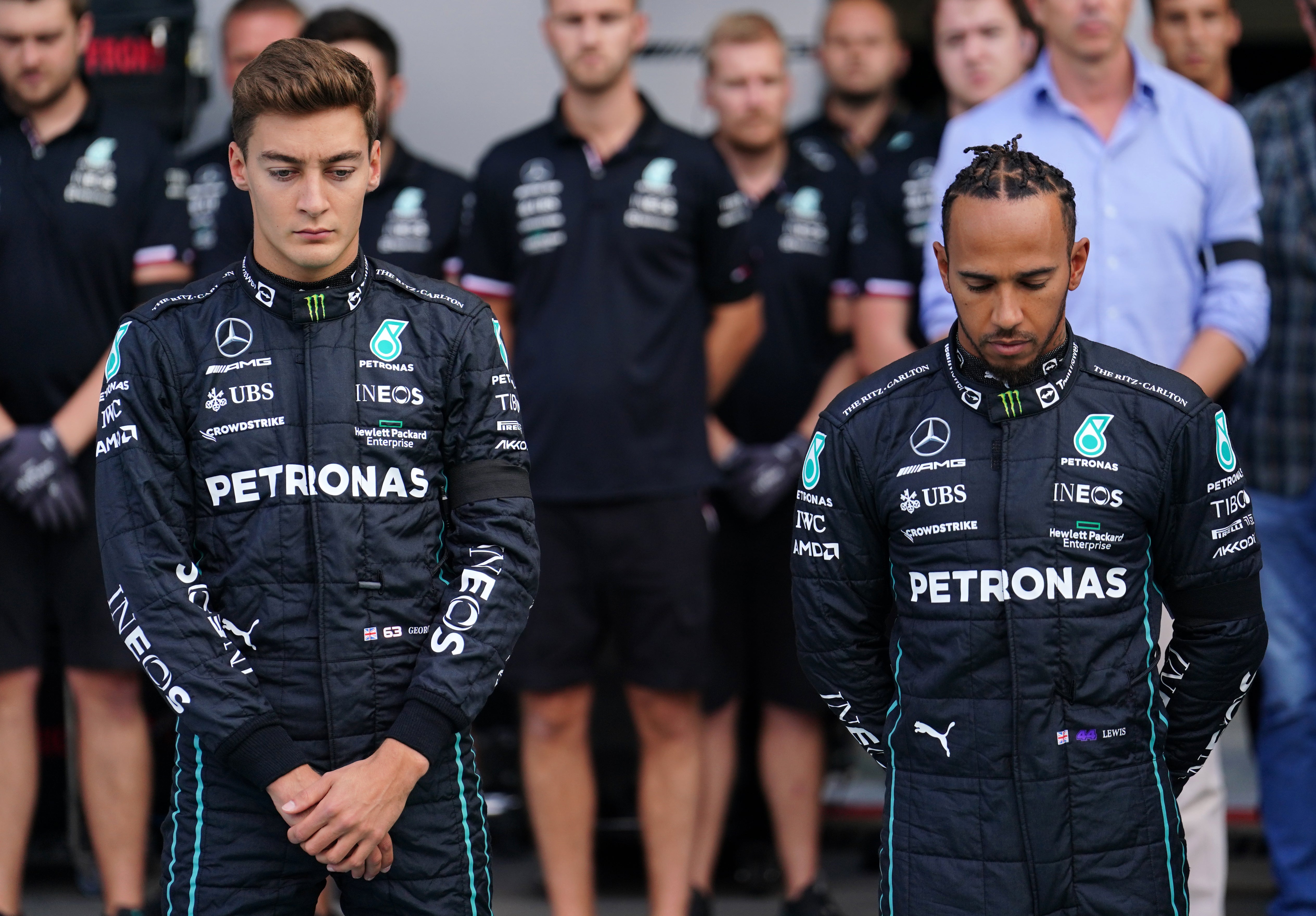 Lewis Hamilton and George Russell observe a one-minute silence in memory of the Queen (David Davies/PA)