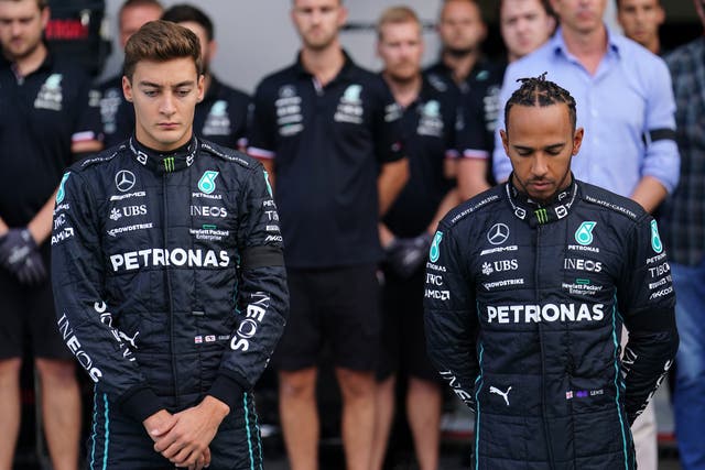 Lewis Hamilton and George Russell observe a one-minute silence in memory of the Queen (David Davies/PA)