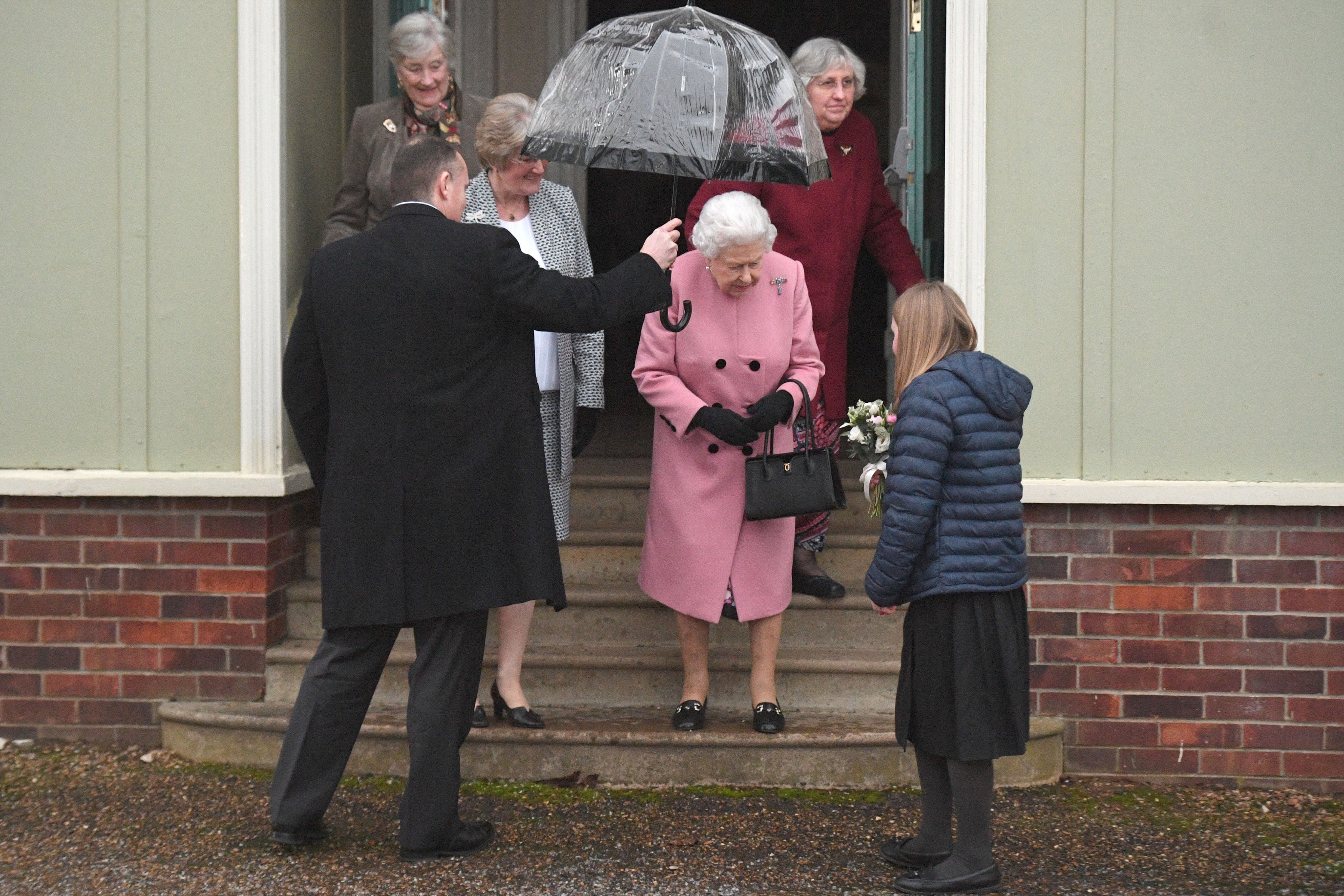The Queen leaves a meeting of the Women’s Institute (Victoria Jones/PA)