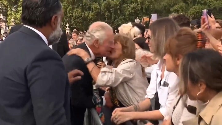 King Charles kissed on cheek and hand by well-wishers outside Buckingham Palace
