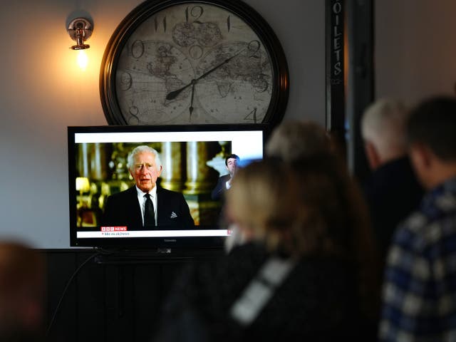 <p>Customers in the Prince Harry Pub, Windsor, watching King Charles III make his first address</p>