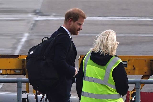 The Duke of Sussex boards a plane at Aberdeen Airport as he travels to London following the death of Queen Elizabeth II on Thursday. (Aaron Chown/PA)