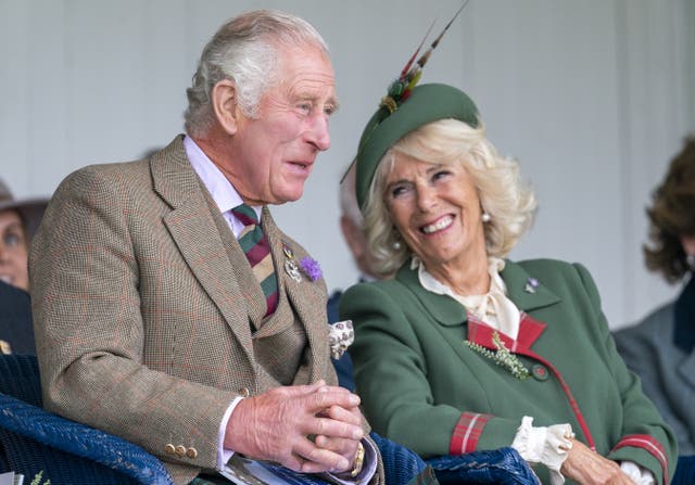 The Prince of Wales and the Duchess of Cornwall, known as the Duke and Duchess of Rothesay while in Scotland, during the Braemar Royal Highland Gathering (PA)