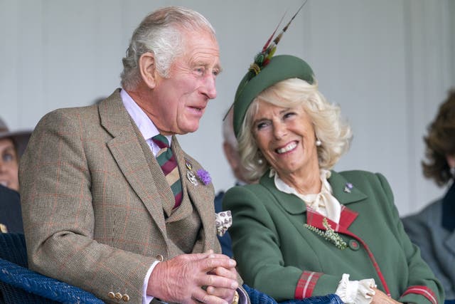 The Prince of Wales and the Duchess of Cornwall, known as the Duke and Duchess of Rothesay while in Scotland, during the Braemar Royal Highland Gathering (PA)