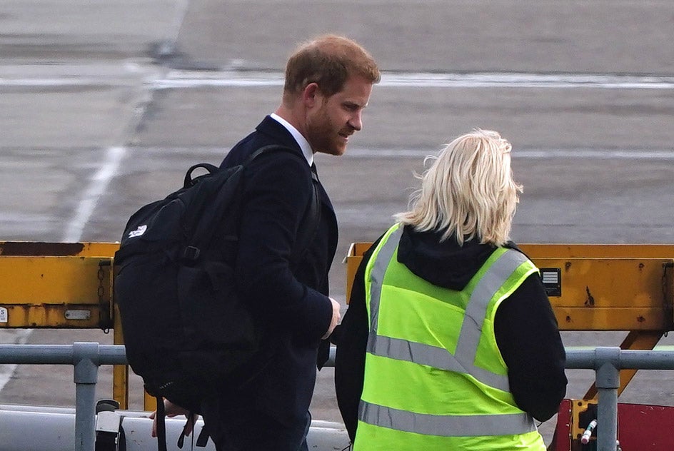 The Duke of Sussex boards a plane at Aberdeen Airport as he travels to London following the death of his grandmother the Queen at Balmoral (Aaron Chown/PA)
