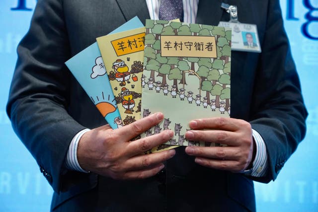 <p>Two men were arrested for possessing children’s books in Hong Kong  </p>