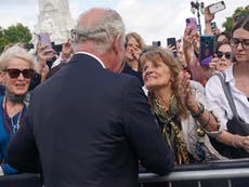 Woman who kissed King Charles said she will take the moment with her ‘forever’