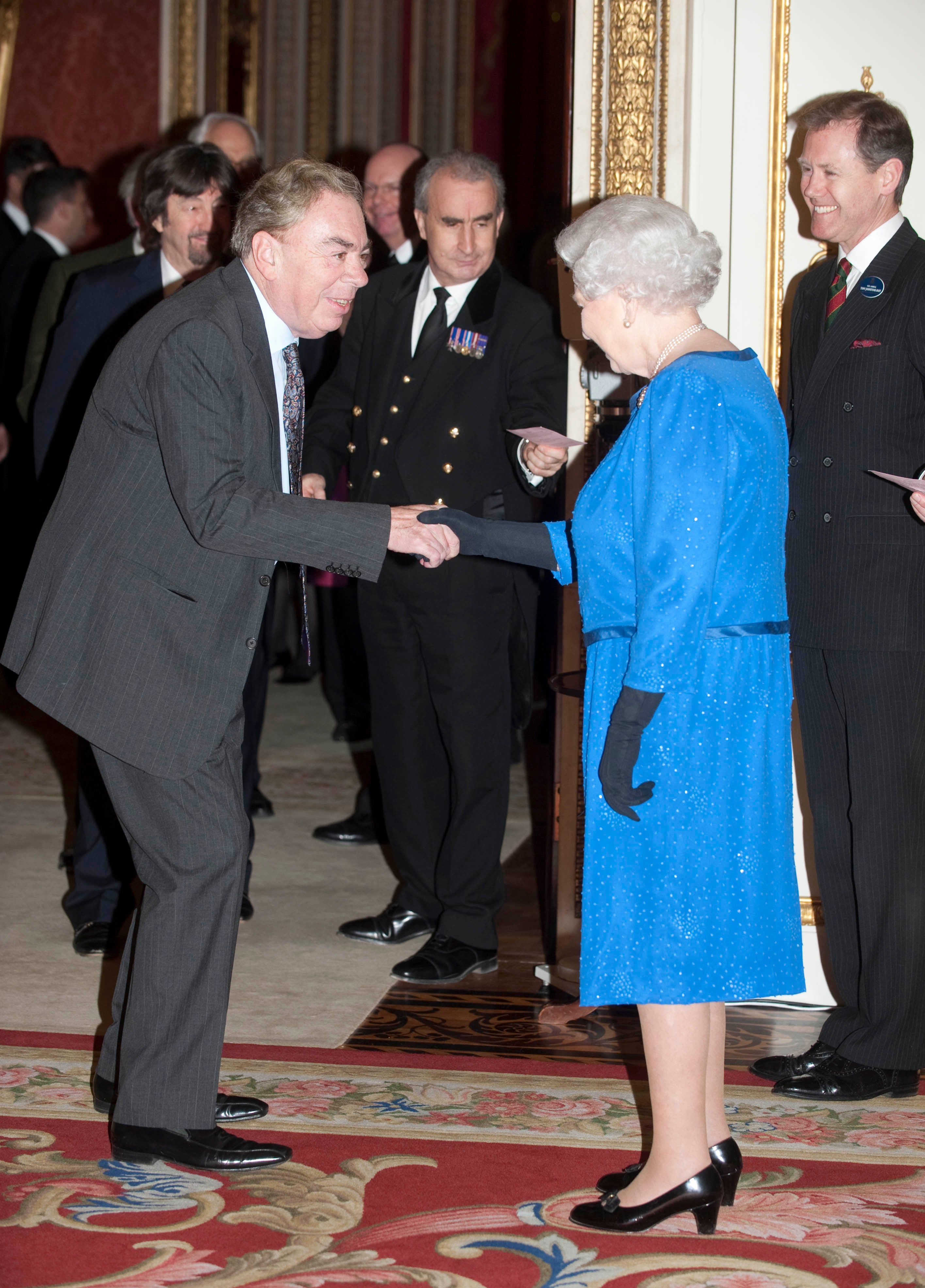 The Queen meets Andrew Lloyd Webber at Buckingham Palace in 2014 (David Crumb/Daily Mail/PA)