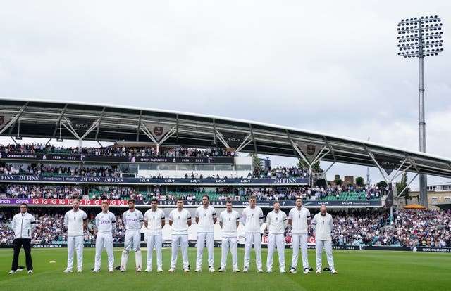 England’s players observe a minute’s silence at the Kia Oval (John Walton/PA)
