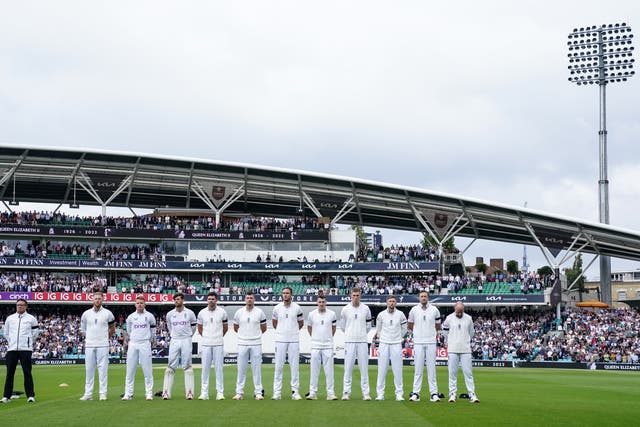 England’s players observe a minute’s silence at the Kia Oval (John Walton/PA)