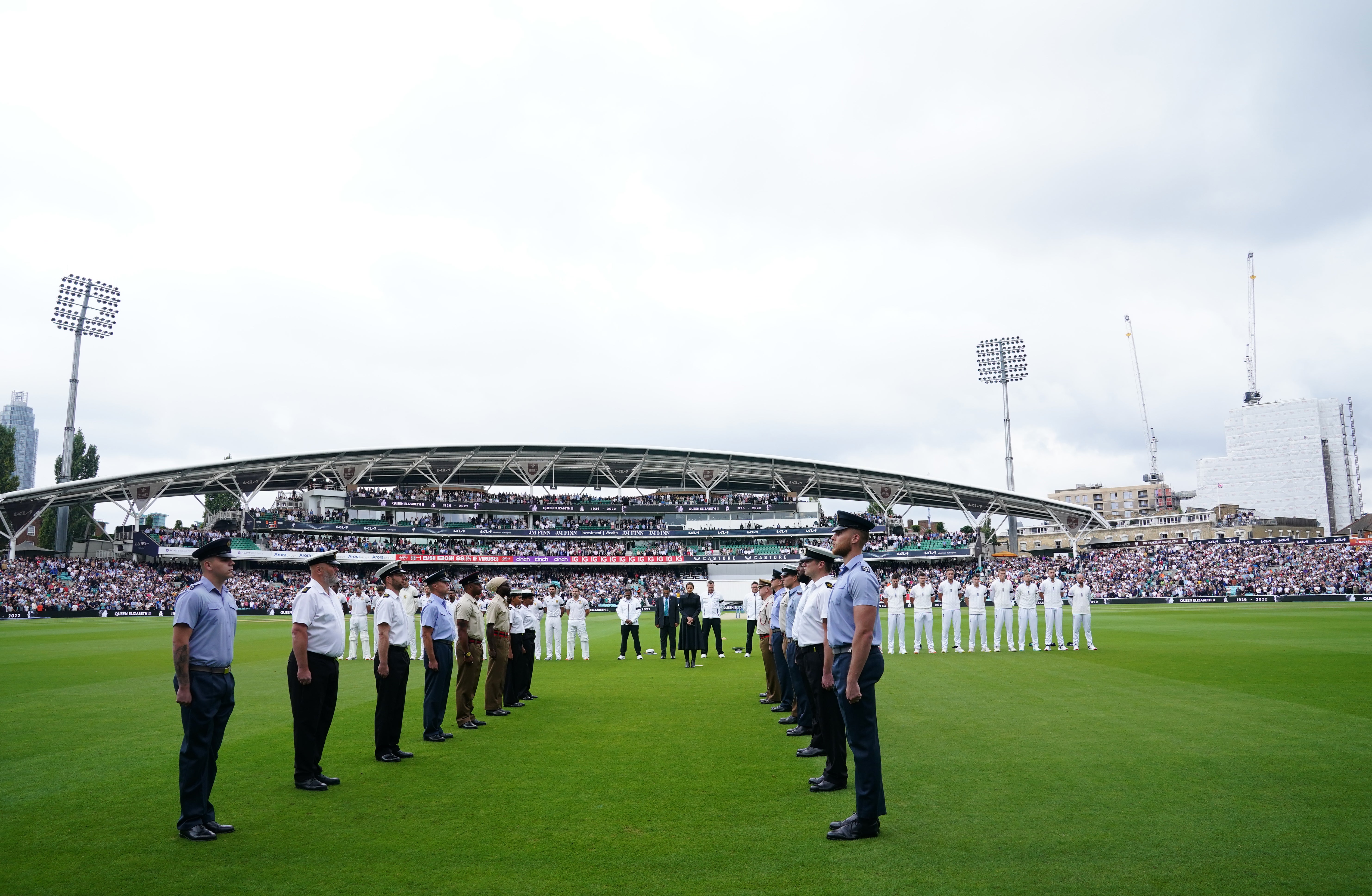 England players observe a minute’s silence on day three of the third LV= Insurance Test match at the Kia Oval (John Walton/PA)